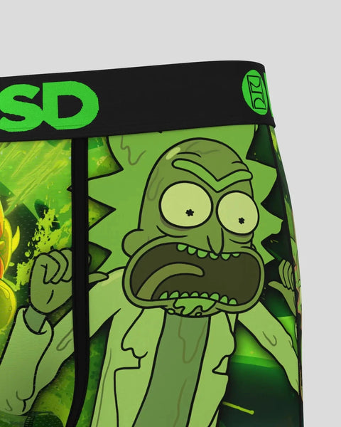 Green slime-covered Rick character figure with exaggerated facial features on product packaging with black band and branding.