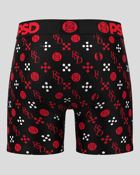 Black boxer briefs with red and white all-over geometric and logo print pattern and red waistband.