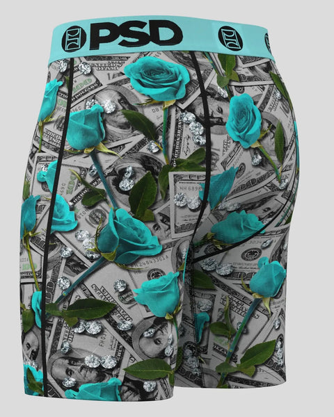 PSD boxer briefs with teal waistband featuring teal roses, green leaves, and dollar bill pattern on gray background.