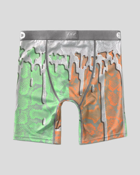 Mismatched boxer briefs with neon green left side and orange right side, featuring abstract black drip pattern and gray waist