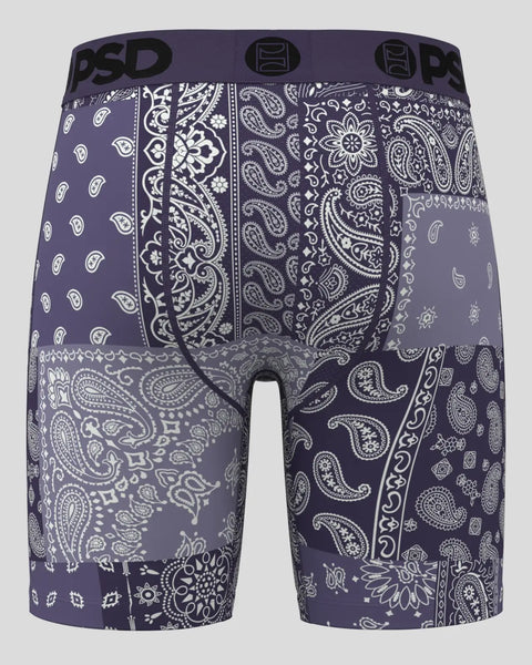 Dusk purple boxer shorts with white bandana and paisley patterned panels throughout.