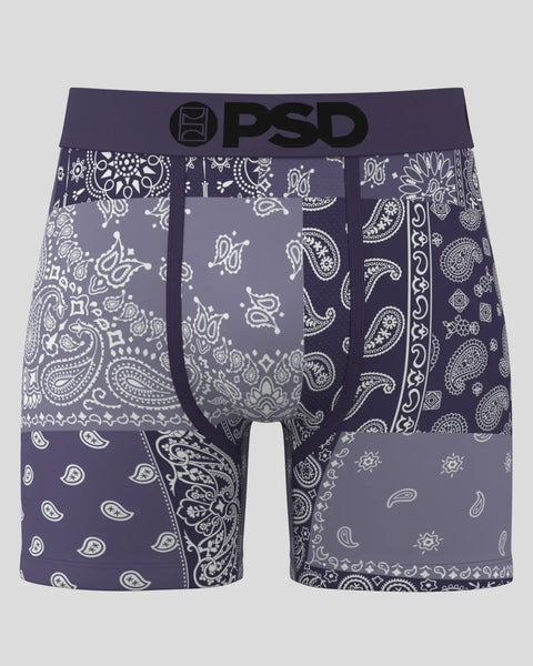 Purple bandana patterned boxer shorts with white paisley and geometric designs throughout.