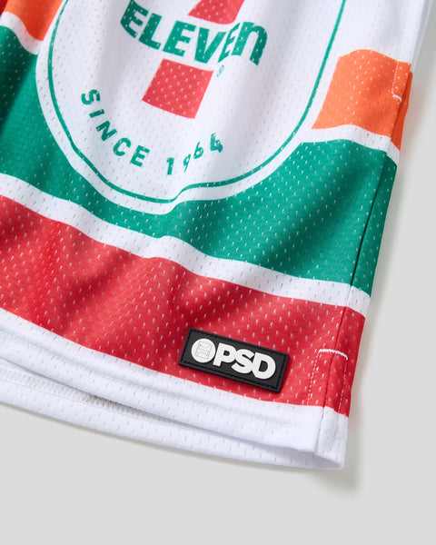 7-Eleven branded short with red, green, white color-blocking, mesh fabric, and OPD woven label.