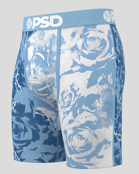 PSD brand blue and white boxer briefs with rose and thorn graphic print design.