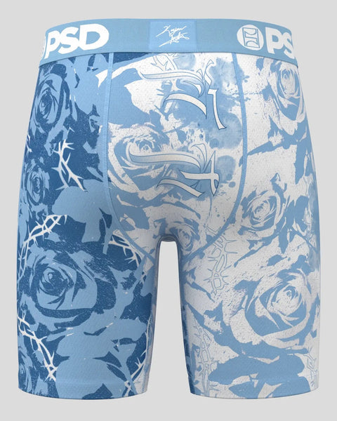 Blue and white PSD boxer briefs with rose and thorn graphic print throughout.