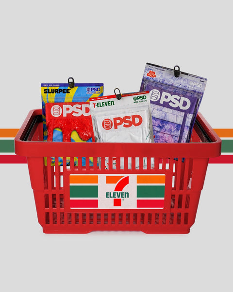 Three PSD branded pouches in a red 7-Eleven shopping basket: Slurpee, T-Eleven, and Big Gulp designs.