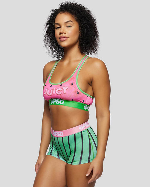 Woman wearing pink sports bra with 