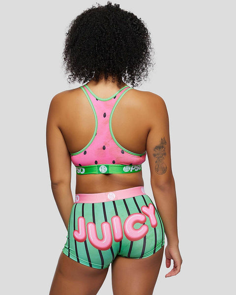 Pink and green two-piece swimsuit with watermelon print design and coordinating belt details, back view.