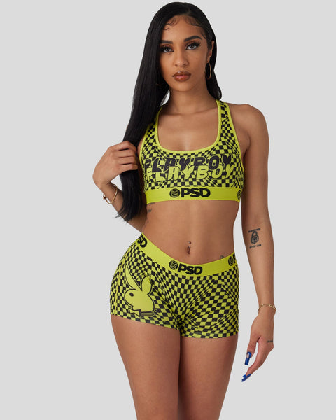 Yellow and black checkered Playboy sports bra and matching shorts set with PSD branding.
